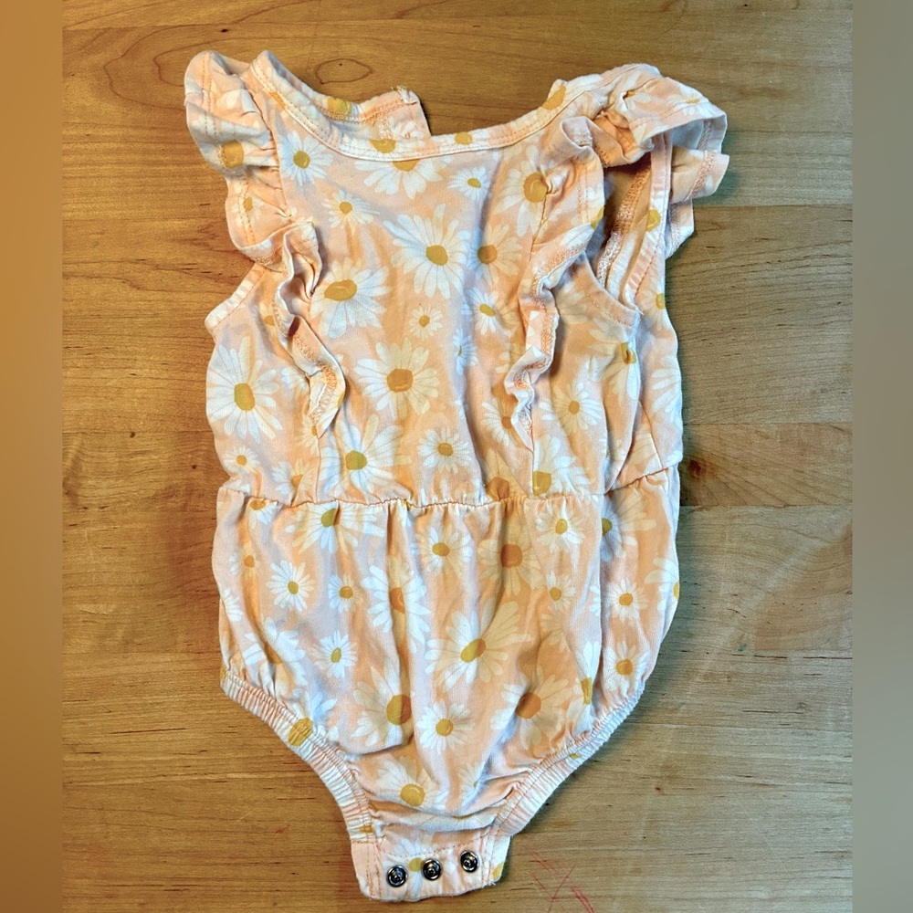Grayson Mini daisy onesie